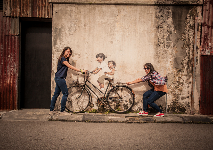 Little Children on Bicycle by Ernest Zacharevic by Julina Rashid