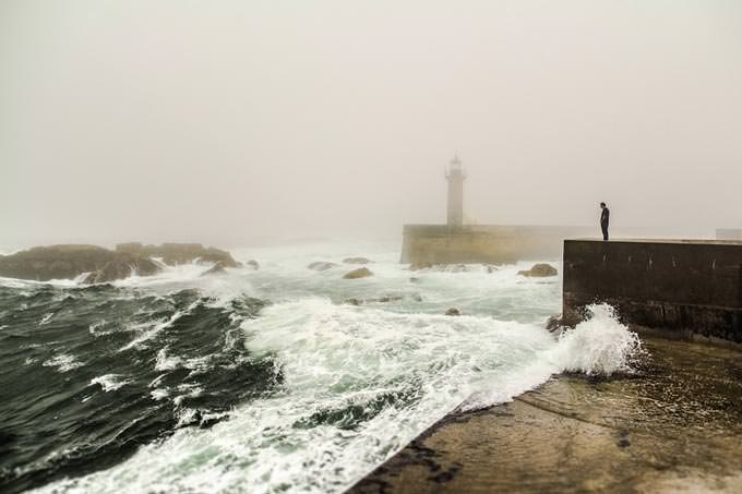 when fog reaches lighthouse by Álvaro Martino