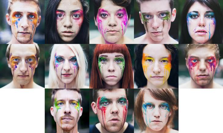 Grid of thirteen close-up portraits of men and women with bright watercolor paint dripping from their eyes