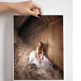 Hand pulling back a curtain to reveal a woman in a white dress sitting in a barn, frame animation composite, Photoshop frame animation tutorial thumbnail
