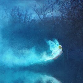 Fairy-like figure in a glowing blue dress amid mist and dark trees at night, Photoshop fairy effect composite tutorial thumbnail