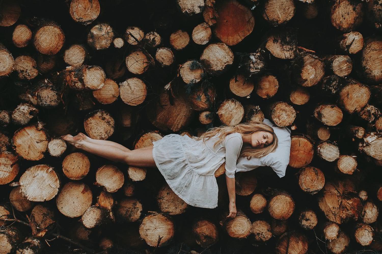 Rosie Hardy Sleeping on Logs