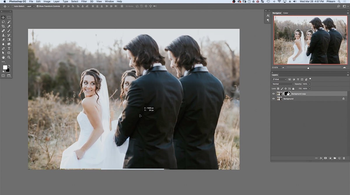 Dragging the masked Background copy with the Move tool, showing a second bride and groom offset from the original