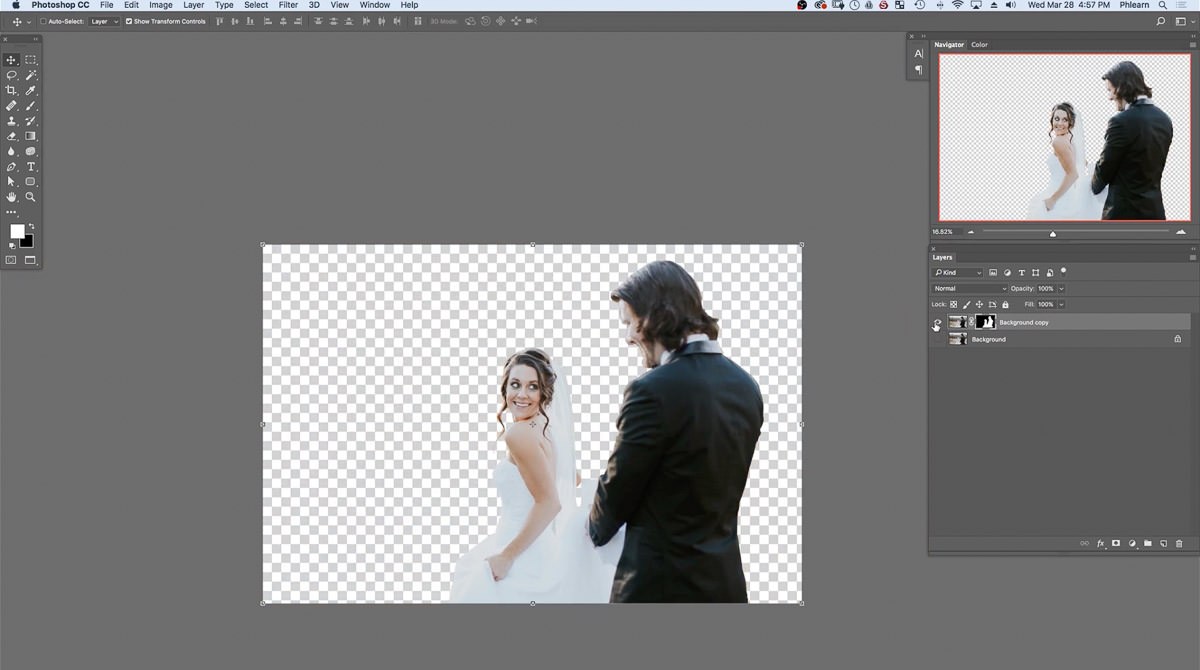 The masked subject layer shown alone on a transparent checkerboard, confirming the couple is cut out cleanly
