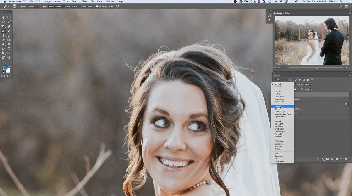 The blend mode dropdown on the new hair detail layer with Lighten highlighted, zoomed in on the bride's hair