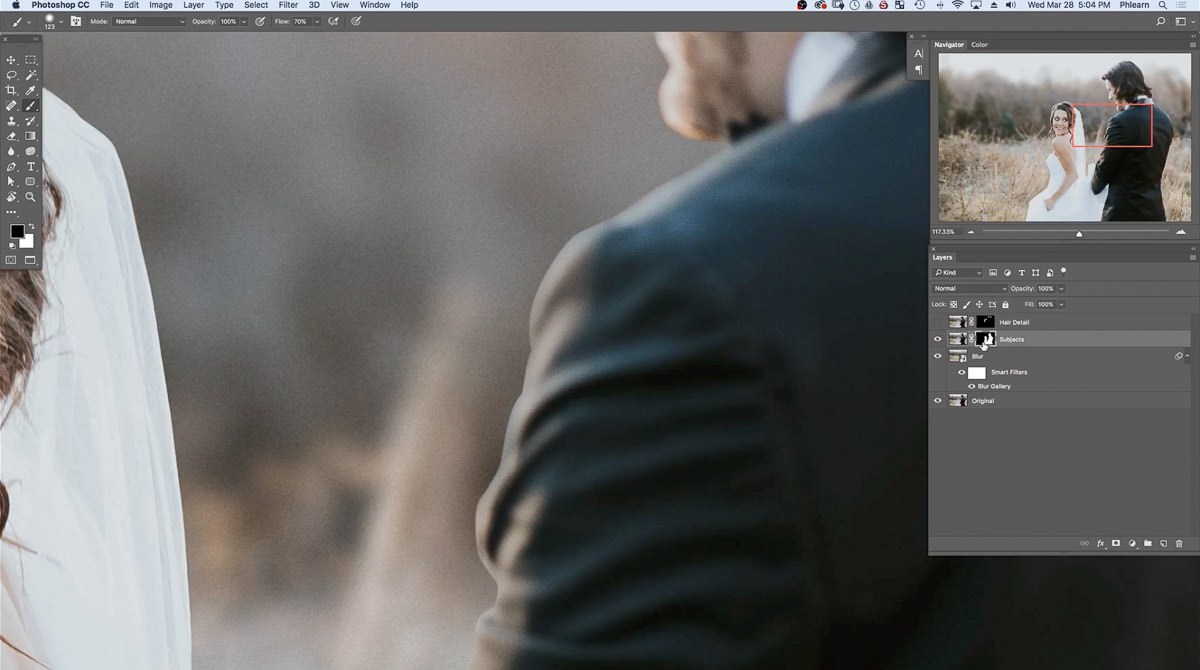 Zoomed in on the groom's shoulder, whose hard Pen tool edge looks too sharp against the softly blurred background