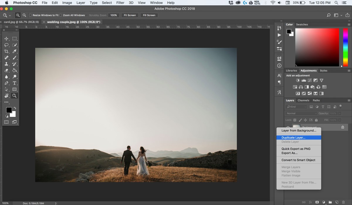 Photoshop screenshot showing a full-frame photo of a couple walking in a field, with the Layers panel open