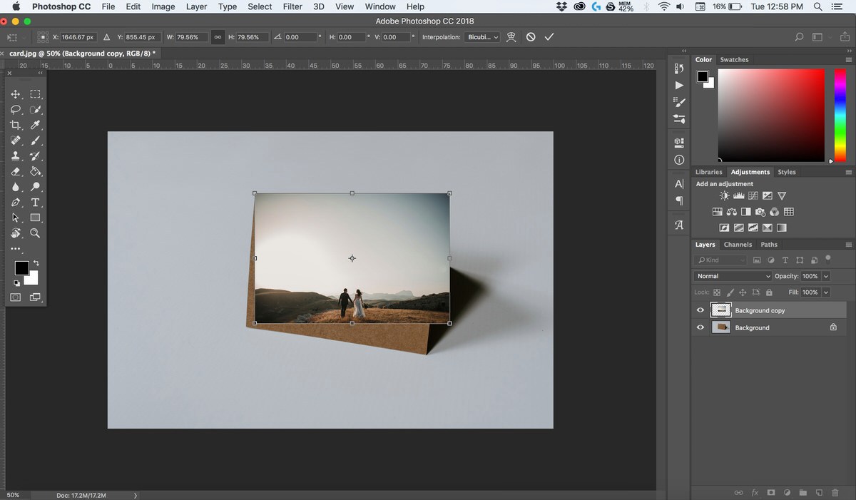 Photoshop screenshot showing the couple's photo positioned on the card mockup layer