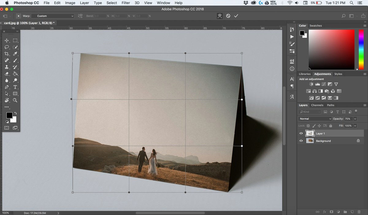 Photoshop screenshot showing Free Transform handles and a grid around the photo as it's scaled to fit the card mockup