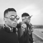 Two young men outdoors in black and white, graded with the Black & White LUTs