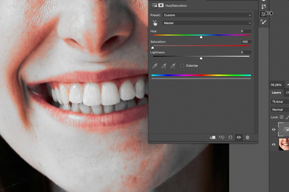 lowering Saturation on a Hue/Saturation adjustment layer to remove yellow