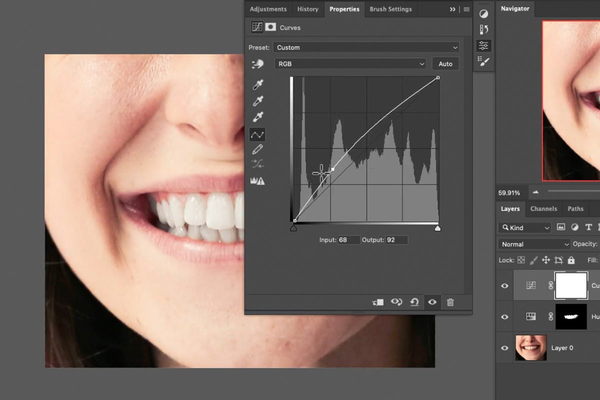 lifting the midpoint of the Curves adjustment to brighten the teeth