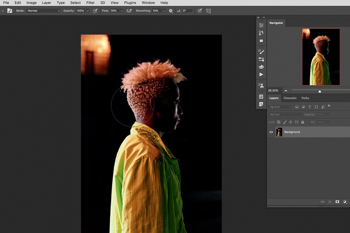 Triangle shape drawn over the portrait with the shape tool