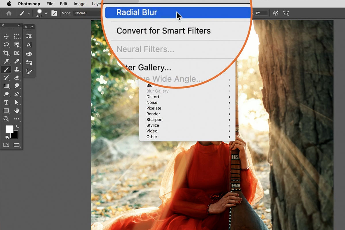 Reapplying Radial Blur again from the top of the Filter menu on the duplicated layer