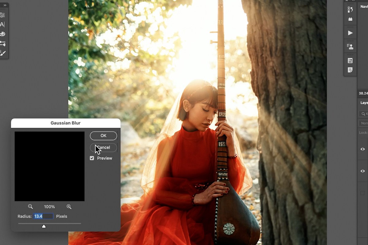 The Gaussian Blur dialog applied to soften the duplicated rays layer
