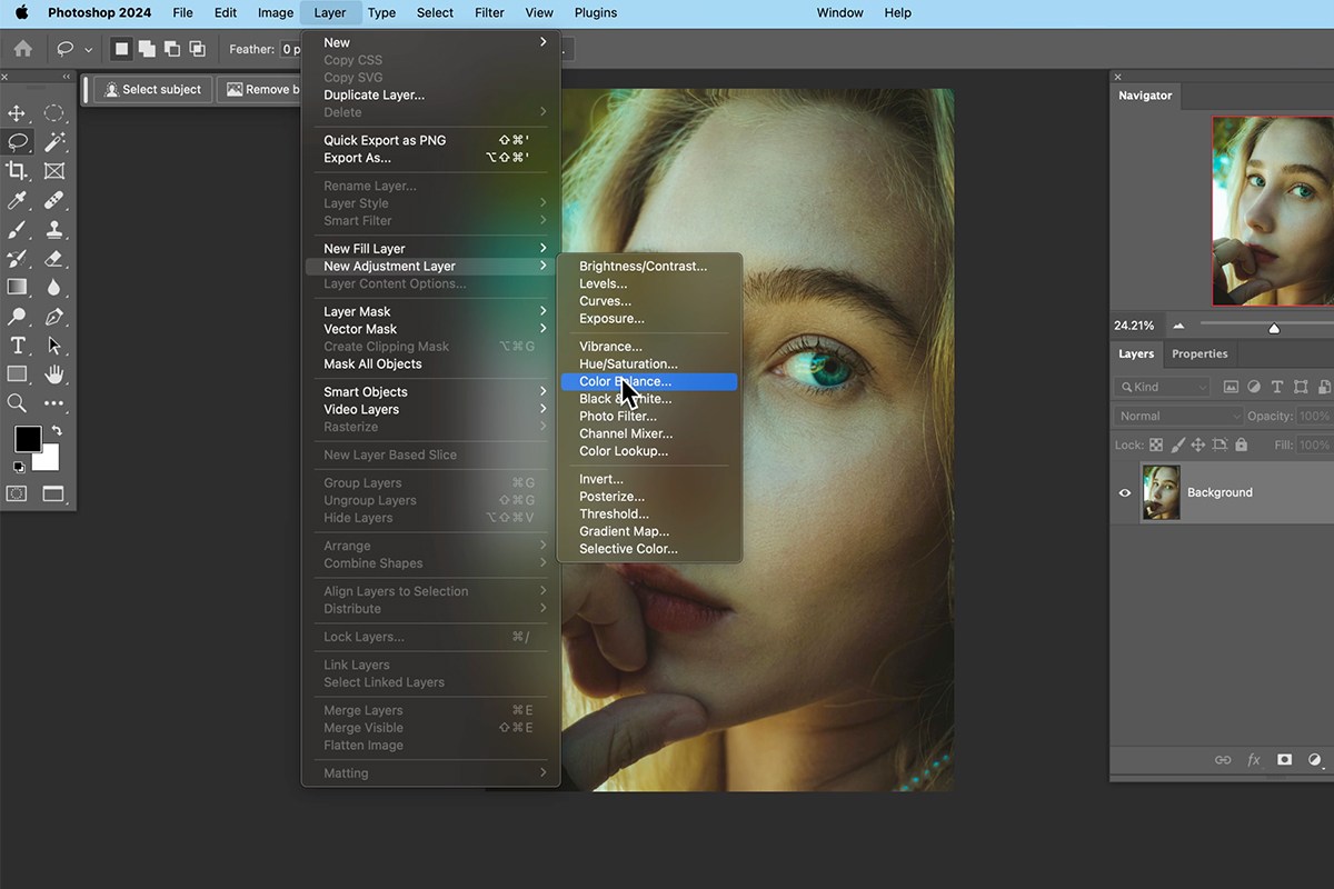 Photoshop Layer menu open to New Adjustment Layer with Color Balance highlighted over a portrait with a green color cast