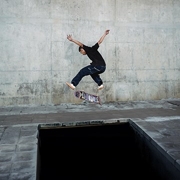 Skateboarder jumping over a concrete pit, thumbnail for a tutorial on using Generate Similar in Photoshop beta