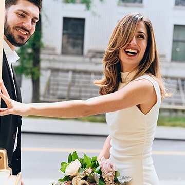 Smiling man and woman close together outdoors in a candid moment, thumbnail for a tutorial on mastering object removal using AI and manual tools in Photoshop