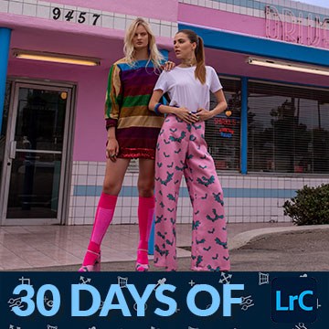 Two models in colorful retro outfits posing outside a pink diner, thumbnail for a tutorial on cropping, straightening and fixing perspective in Lightroom