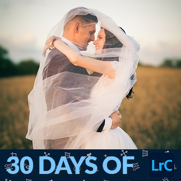 Bride and groom embracing under a flowing veil in a golden field, thumbnail for a tutorial on editing wedding photos in Lightroom Classic