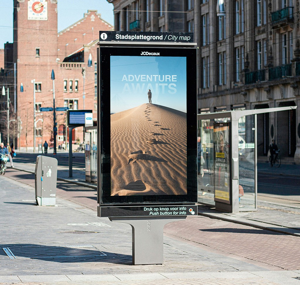 The same billboard carrying an advertisement placed as a linked Smart Object in Photoshop