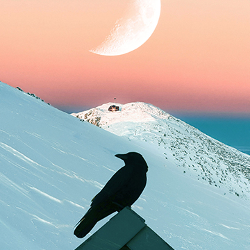 A crescent moon over a snowy mountain peak with a silhouetted crow perched on a rooftop edge — How to Use Blending Modes in Photoshop 2025 tutorial thumbnail