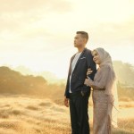 A couple in a golden field