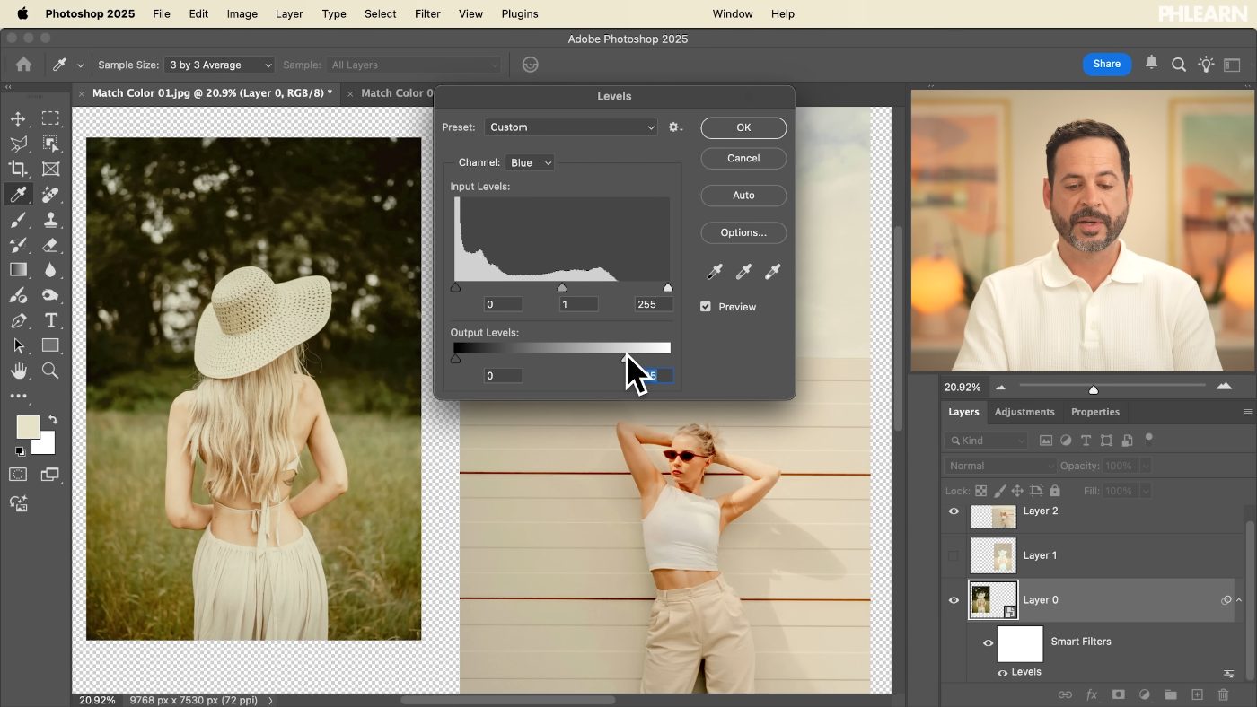 Comparing the corrected image against the source photograph while adjusting Levels in Photoshop