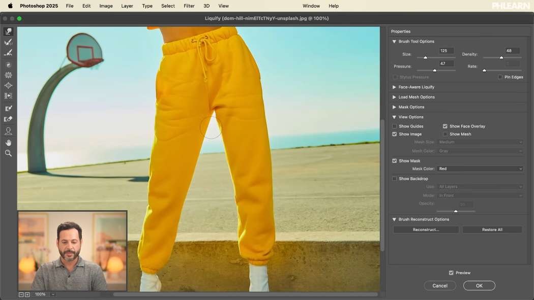 Reshaping a garment with the Forward Warp tool in Liquify
