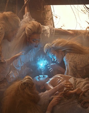 The same scene with the blue glow intensified and mist added around her
