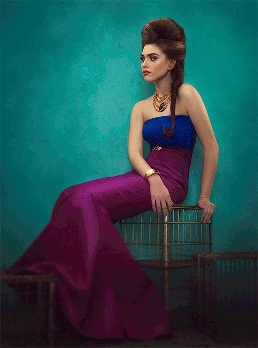 The same portrait after retouching and colour grading, with richer gown colour and smoother skin