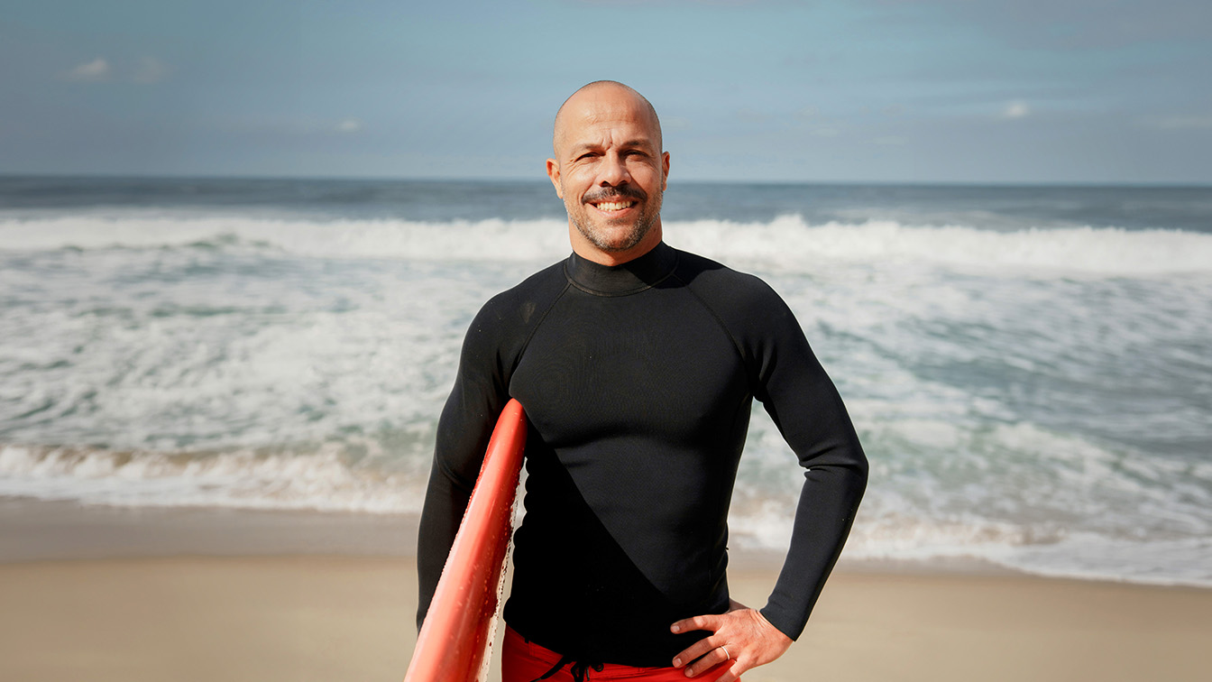 The surfer brightened and the background darkened using multiple masks on one layer