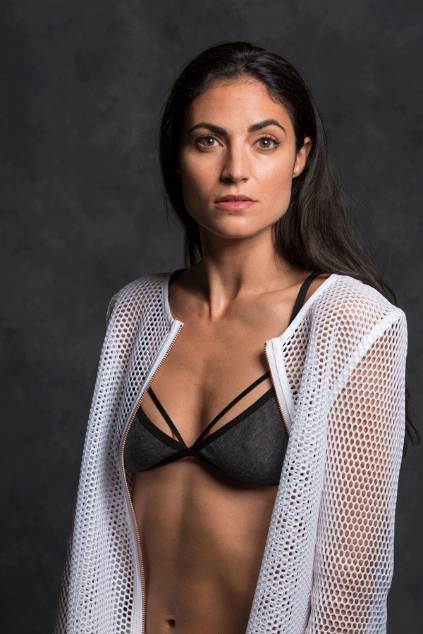 The same portrait after retouching, with smoother skin and cleaner lace detail