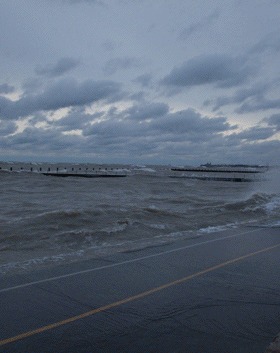 Flat grey seascape with an empty horizon