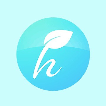 Hearth tea and spice leaf logo mark on a pale blue circle
