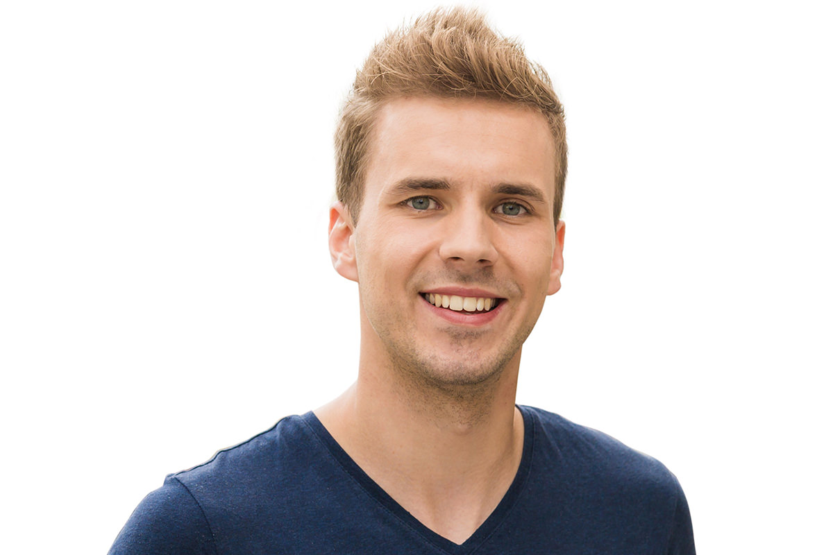 The same man cut out onto a white background with natural hair edges, after the Brush tool cutout