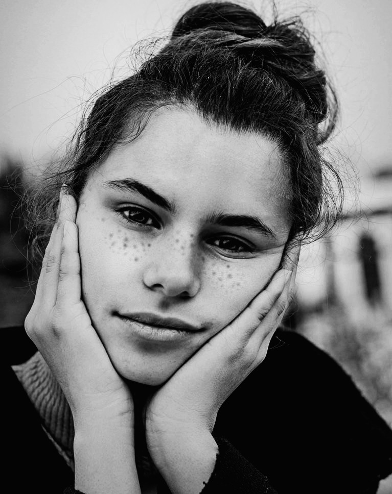 Black and White Photoshop action after: close-up portrait with High Contrast 1