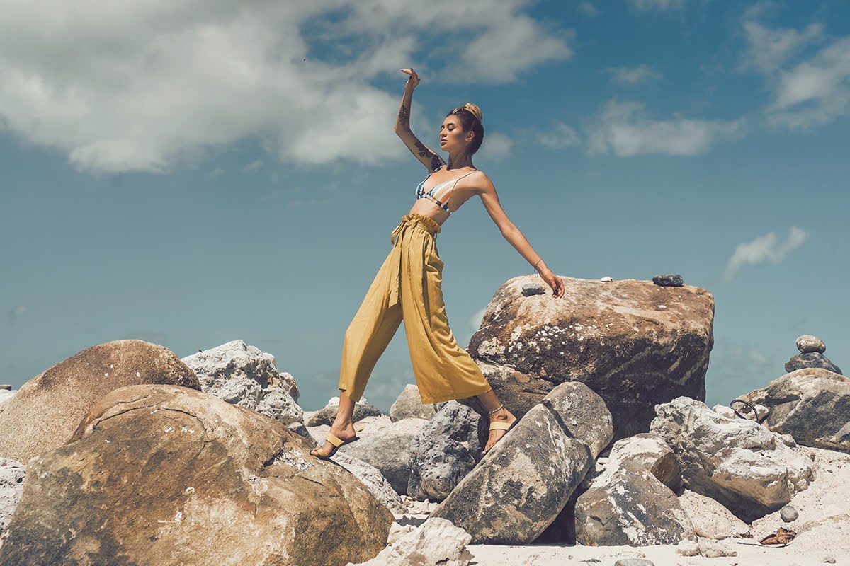 Woman on coastal rocks, graded with a free PHLEARN LUT