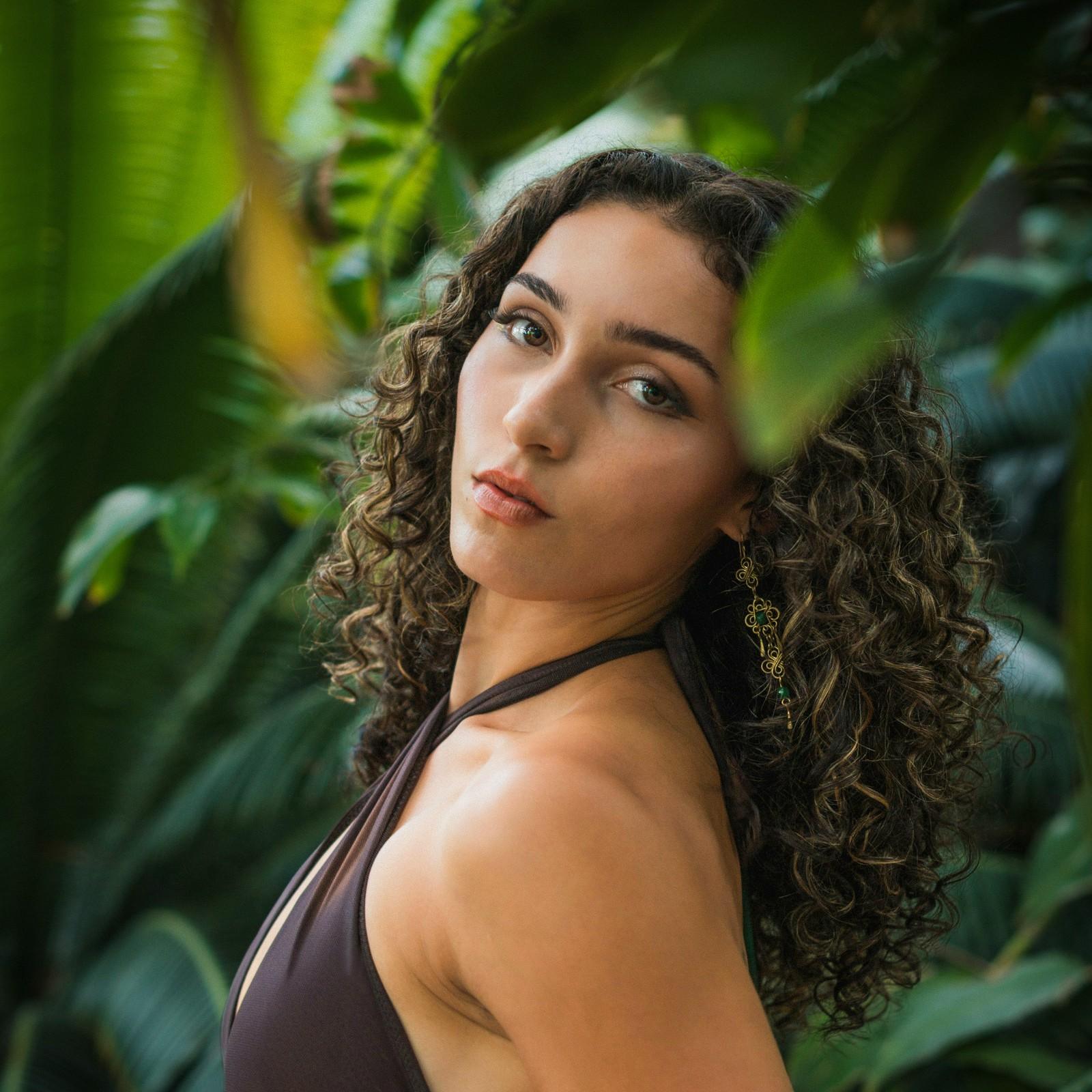 The same portrait after the Photoshop 2026 tips: cloud Select Subject and a Light adjustment brighten the subject