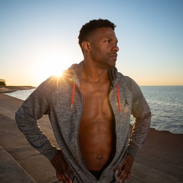 Portrait of a man at sunrise with natural, color-corrected dark skin tones