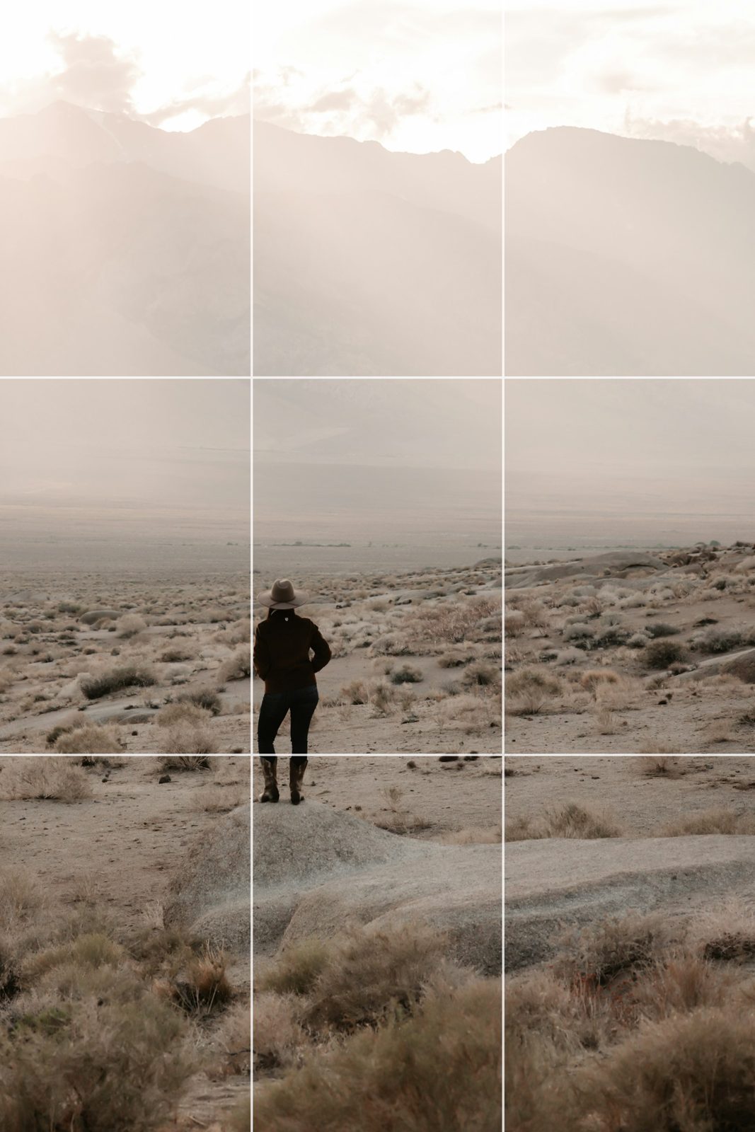 Photography composition rules drawn over one photo in the crop: the rule-of-thirds grid over a lone figure in a desert, just off its left line